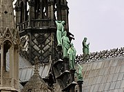 Three apostles with St. John's eagle in the foreground