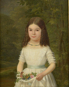 "Little girl holding flowers"