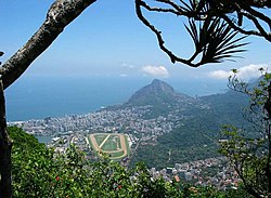 Mountains and harbor border the heavily populated city of Rio de Janeiro