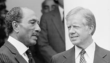 Sadat (left) with the U.S. President Jimmy Carter (right) in Washington, D.C., on 8 April 1980, during a visit to the White House. Sadat and Carter - USNWR.jpg