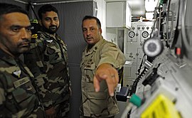 Pakistan Navy SEAL Team members receiving instructions on the compression diving from the US Navy SEALs in 2011. US Navy 110612-N-OT964-194 Chief Navy Diver Aaron Knight, assigned to Commander Task Group (CTG) 56.1.jpg