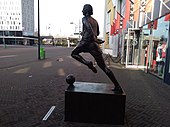 Cruyff's statue at the main entrance of the Johan Cruijff Arena in Amsterdam 2020 Johan Cruijff (Hans Jouta ) (4).jpg