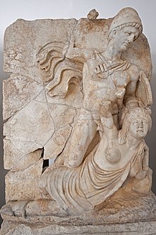 The emperor Claudius, heroically nude, overpowering the female personification of Britannia, from Aphrodisias in present-day Turkey Aphrodisias Museum Claudius and Britannica 4638.jpg