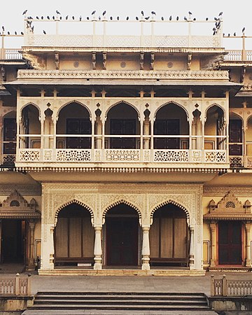 This is the City Palace, Jaipur, built by Jai Singh II; may be stonecarving, not plasterwork