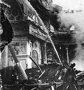 Burning ballroom at the Royal Castle, Warsaw, as a result of incendiary bombing by the German Luftwaffe Ballroom Castle Warsaw September 17 1939.jpg