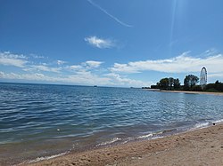 Beach "Tolkun" in Bosteri during sunny weather. June 2022.