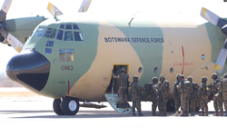 Botswana soldiers board a Botswana Defence Force plane to Mozambique, July 2021 Botswanatroopsboardplane.png