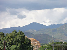 Cerro de Punta, Puerto Rico's highest peak, and its TV transmission towers Cerro de Punta as seen from Museo de Arte de Ponce, Ponce, Puerto Rico (DSC03460).jpg