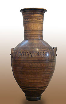 The Dipylon Amphora, mid-8th century BC, with human figures for scale. The vase was used as a grave marker. National Archaeological Museum, Athens. Dypilon vase 1.jpg