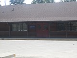 The U.S. Post Office in Fouke is of log cabin design.