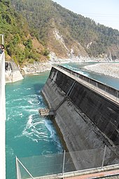 Middle Marsyangdi Hydroelectric Dam. Nepal has significant potential to generate hydropower, which it plans to export across South Asia. Kaligandaki A HPS Tailrace Channel.jpg