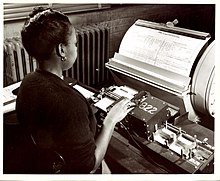 A clerk creating punch cards containing data from the census. Keypunch operator 1950 census IBM 016.jpg