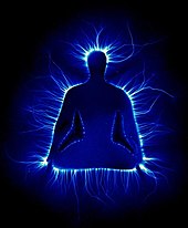 A Kirlian photo showing an artistic representation of a man in the Lotus position, surrounded by a blue glow Lotus Kirlian.jpg