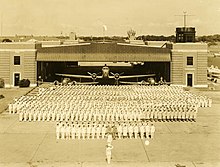 Monthly inspection of the Naval Photography School at NAS Pensacola, 29 July 1944. Photograph by Joseph Janney Steinmetz. Monthly inspection of the Naval Photography School at NAS Pensacola (July 29, 1944).jpg