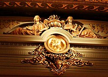 Bust of Mozart with figures of Poetry and Music Philadelphia Academy of Music interior.jpg