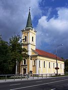 The monumental Church of the Holy Cross, built in 1894, in the square of the same name along the Pesti út