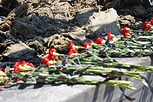 Flowers at the memorial Shopping center in Kremenchuk after Russian shelling, 2022-06-29 (01).jpg