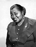 Black-and-white publicity photo of Hattie McDaniel in 1941.[2]