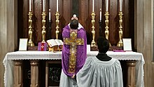 A priest celebrating the Traditional Latin Mass Traditional Latin Mass - Elevation.jpg