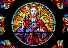 Sacred Heart at the centre of a rose window, Parish of the Immaculate Conception, Sao Paulo, Brazil Vitral em Igreja Santa Efigenia.jpg