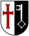 Gemeinde Lügde bis 31. Dezember 1969 "Im gespalteten Schild vorn in Silber (Weiß) ein rotes Ankerkreuz, hinten in Schwarz ein silberner Schlüssel mit dem Bart rechts und oben."