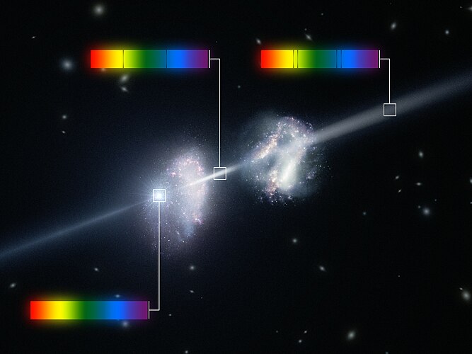 Художественное представление гамма-всплеска в системе из двух молодых галактик в ранней Вселенной