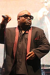 Cee-Lo Green performing with a gigantic screen as background showing himself