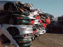 Crushed EV1s in a junk yard are shown in the film Ev1 crush5.jpg