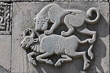 Lion fighting a bull on the entrance of the Great Mosque of Diyarbakir Great Mosque of Diyarbakir 2968.jpg
