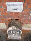 Original boundary stone for the Shrewsbury and Hereford Railway preserved at Hereford station in 2011