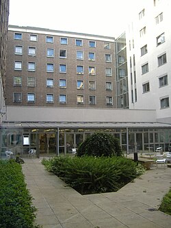 The courtyard by the common room and conservatory. IH Bar courtyard.JPG