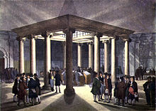 Interior of the London Coal Exchange, c. 1808. European 17th-century colonial expansion, international trade, and creation of financial markets produced a new legal and financial environment, one which supported and enabled 18th-century industrial growth. Microcosm of London Plate 017 - The Coal Exchange (tone).jpg