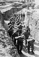 Prisoners hauling earth for the construction of the "Russian camp" at Mauthausen