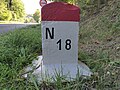 Alter Kilometerstein der N18 bei Reuler