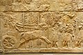 Le souverain Sargon II sur son char. Musée de l'Oriental Institute de Chicago.
