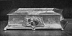 Black and white photograph of a casket