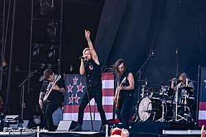 Skid Row performing in 2023