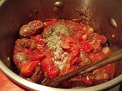 Ajout des tomates et herbes de Provence.