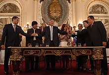 Rafael Correa, Evo Morales, Nestor Kirchner, Cristina Fernandez, Luiz Inacio Lula da Silva, Nicanor Duarte, and Hugo Chavez signed the founding charter of the Bank of the South. Banco del Sur.jpg