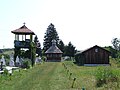 Vedere de ansamblu. Biserica, clopotniţa, prăznicarul