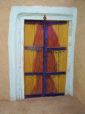English: It is a wooden door used in rural Punjab.