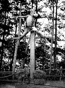 Early Meiji period crucifixion (c. 1865-1868), Yokohama, Japan. A 25-year-old servant, Sokichi, was executed by crucifixion for murdering his employer's son during the course of a robbery. He was affixed by tying to a stake with two cross-pieces. Japanese Crucifixion.jpg