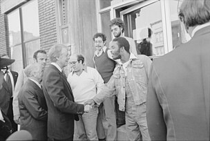 President elect Carter shakes hands with residents of the Bronx, New York City, shortly after being elected. Jimmy Carter greets residents of South Bronx, New York - NARA - 176402.jpg