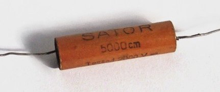 Wound metallized paper capacitor from the early 1930s in hardpaper case, capacitance value specified in "cm" in the cgs system; 5,000 cm corresponds to 0.0056 μF.
