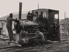 Convicts adjusting a locomotive, 1931