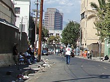 Skid Row, Los Angeles contains one of the largest stable populations, between 5,000 and 8,000, of homeless people in the United States. Los Angeles Skid Row.jpg
