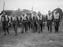 Pilots of the 303 Polish Fighter Squadron during the Battle of Britain, October 1940 Pilots of No. 303 (Polish) Squadron RAF with one of their Hawker Hurricanes, October 1940. CH1535.jpg