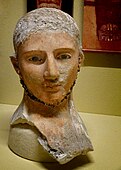 Plaster funerary portrait bust of a man from El Kharga, Upper Egypt Roman Period, 2nd century CE