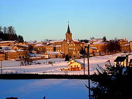 The church and surrounding buildings in winter