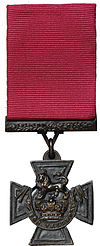 a colour photograph of a medal suspended from a riband